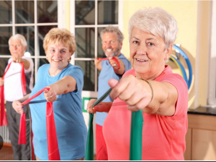 Seniors using exercise bands