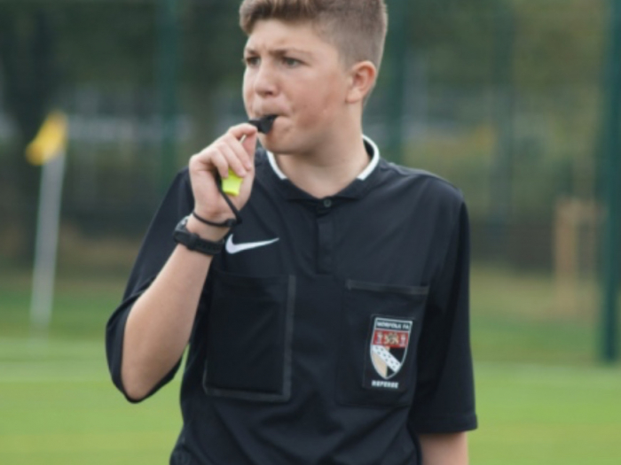 Young football referee